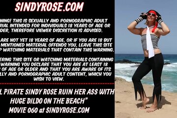 Anal pirate Sindy Rose ruin her ass with curvy huge black dildo on the beach